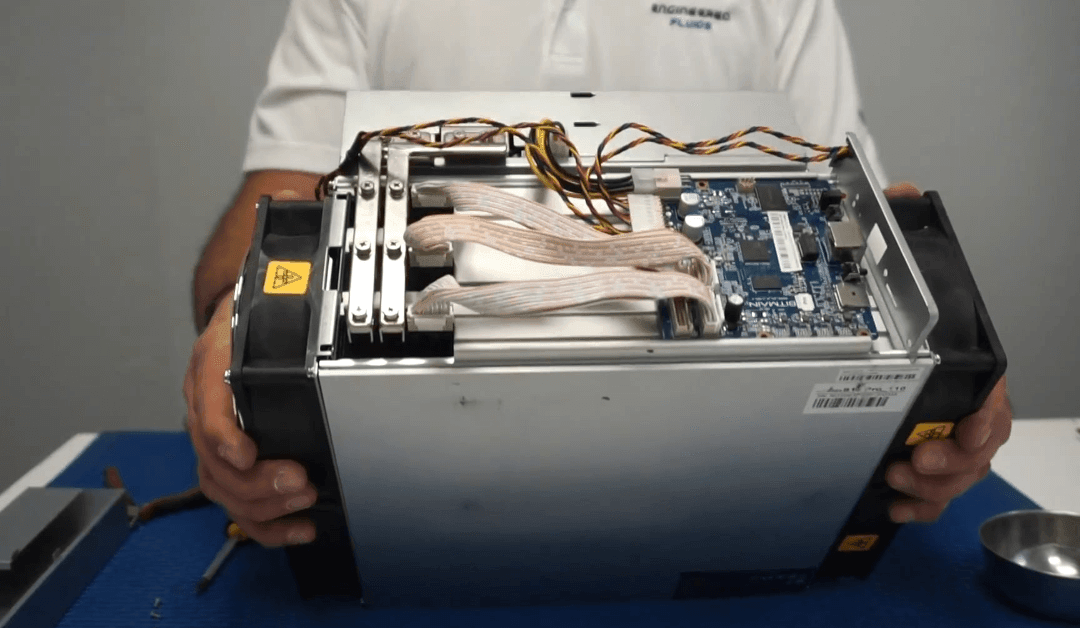 What is an Immersion Cooling system, and how does it work?